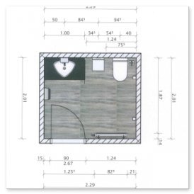In diesem Badezimmer-Layout sind die sanitären Anlagen klar angeordnet, mit einem eleganten Bodenbelag und praktischen Maßen.